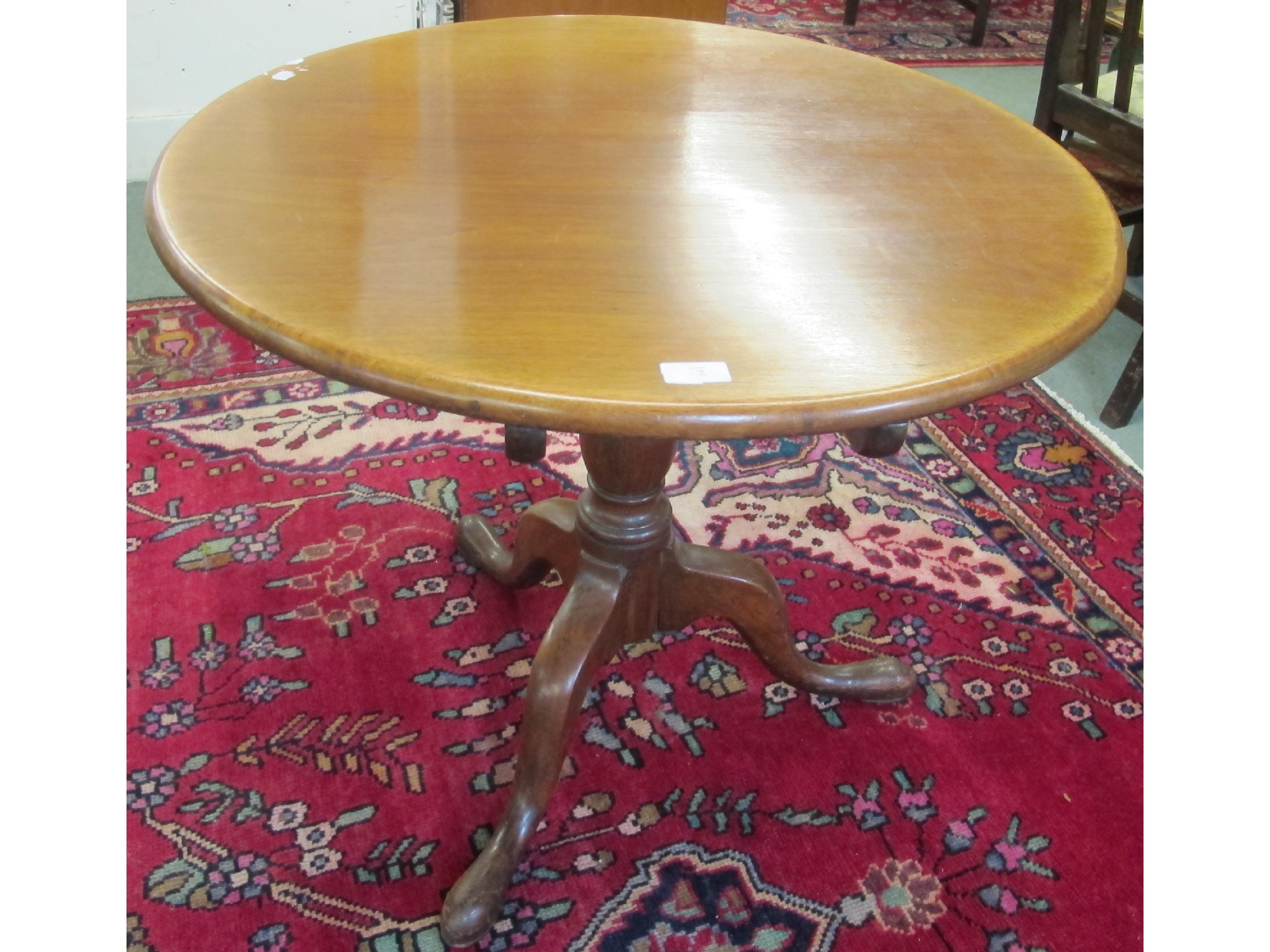 Appraisal: An Edwardian mahogany snap-top table