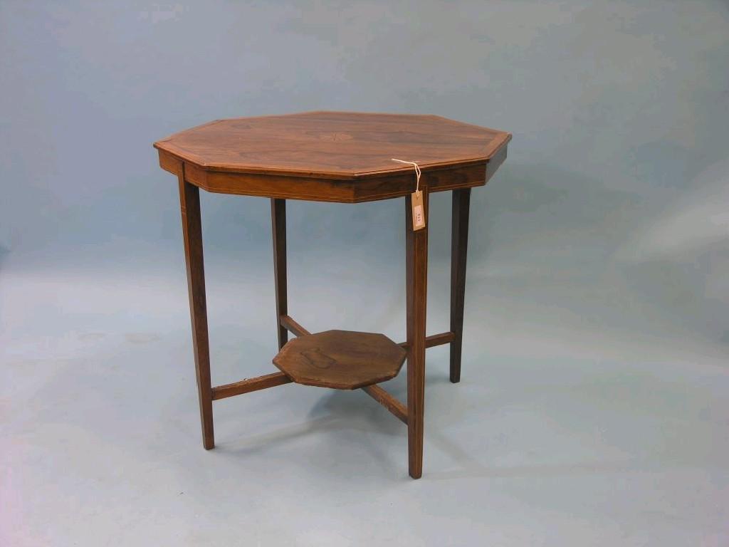 Appraisal: An Edwardian inlaid rosewood centre table octagonal-shape on square tapering