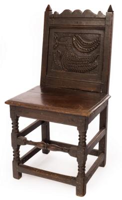 Appraisal: A William Mary oak chair with solid seat the panelled