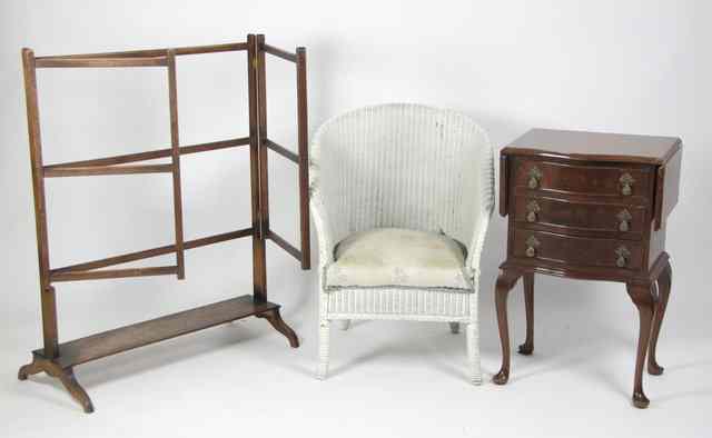 Appraisal: A Lloyd-Loom type armchair a two-flap telephone table with three