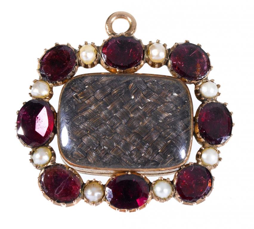 Appraisal: AN ANTIQUE ENGLISH GARNET SEED PEARL AND GOLD MOURNING BROOCH