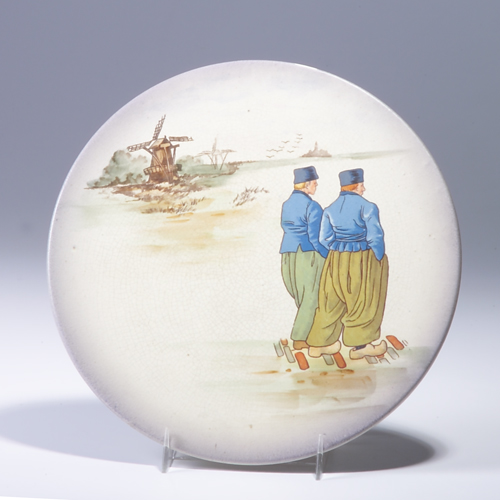 Appraisal: ROSEVILLE Dutch circular wall plaque painted with two men against