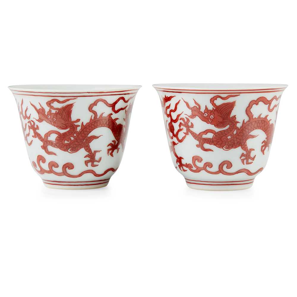 Appraisal: PAIR OF IRON-RED 'DRAGON' CUPS WANLI MARK BUT TH CENTURY