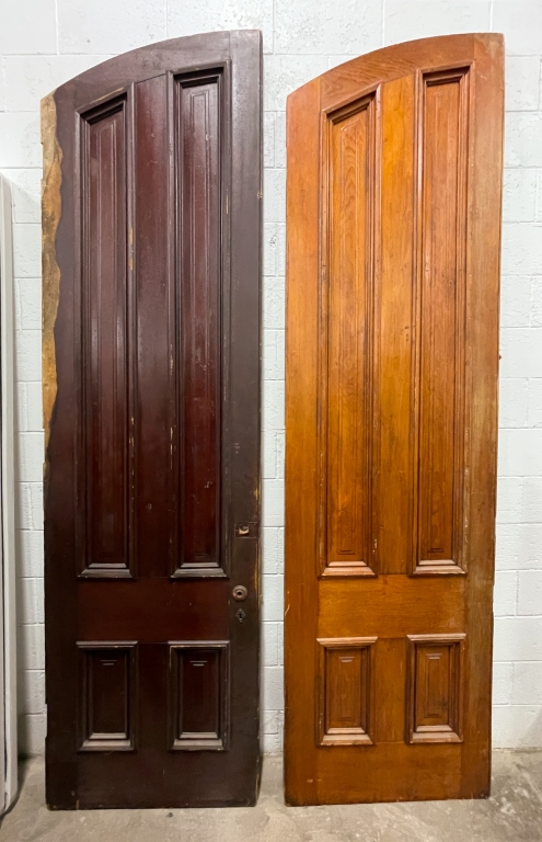 Appraisal: PAIR OF ROMANESQUE REVIVAL DOORS Ca yellow pine Pair create