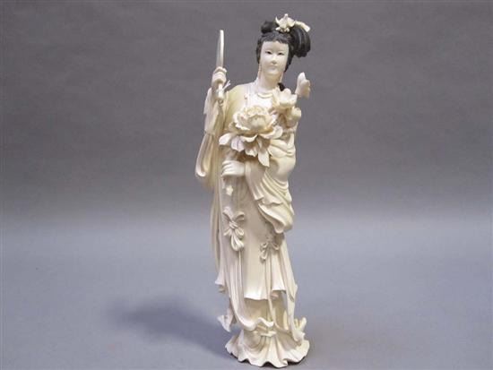 Appraisal: CHINESE CARVED IVORY FIGURE OF A ROBED WOMAN th C