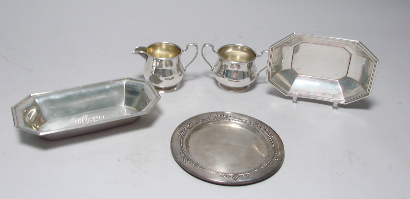 Appraisal: FIVE PIECES OF STERLING SILVER HOLLOWWARE By various makers Includes