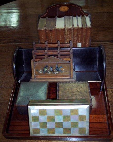 Appraisal: An Edwardian mahogany miniature bookcase the shaped back with oval