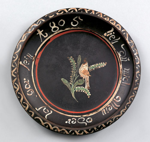 Appraisal: Redware plate dated with central decoration of a bird and