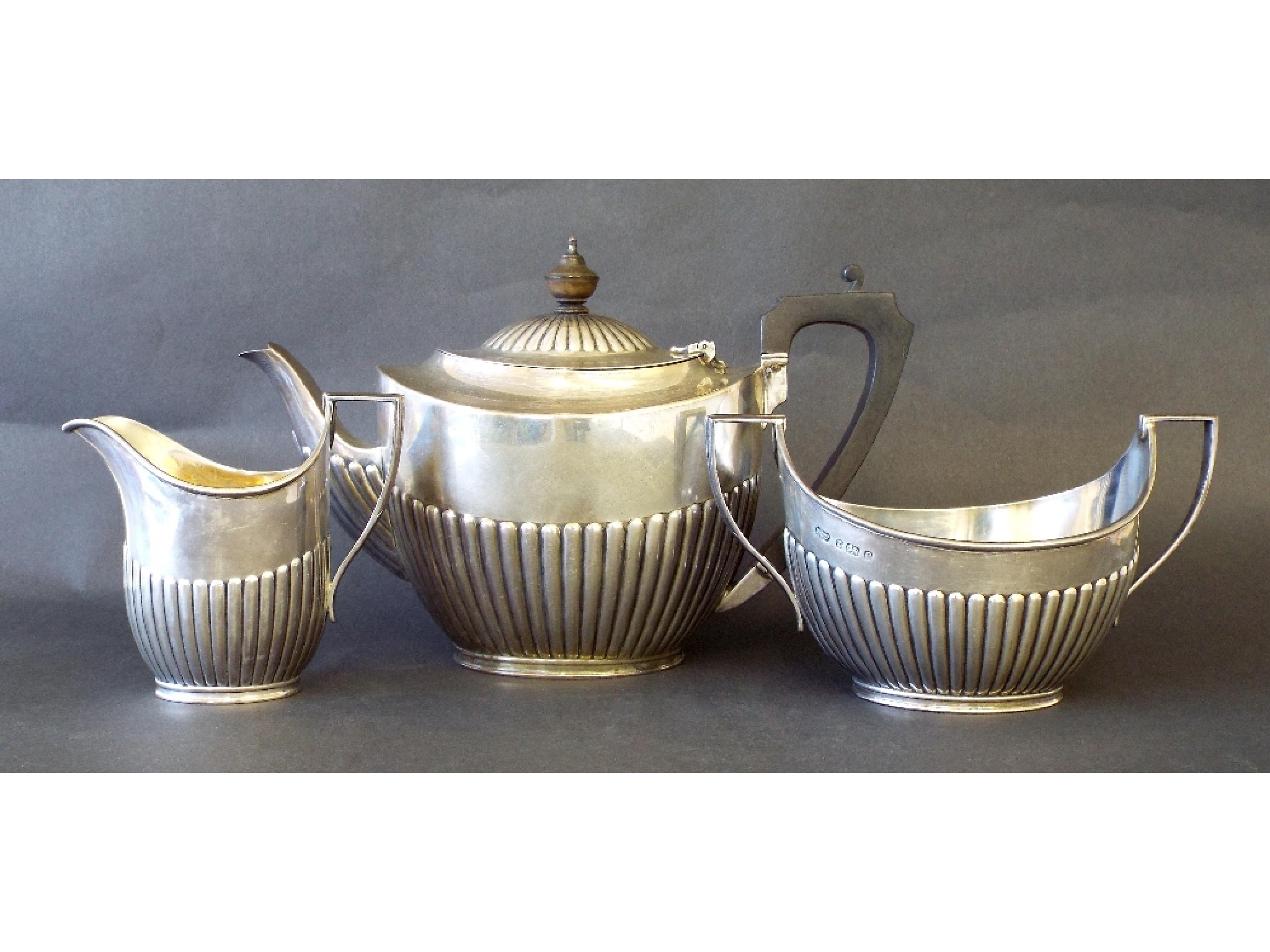 Appraisal: Elkington Co silver three piece half fluted tea service Birmingham