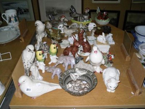 Appraisal: A collection of pottery and porcelain figural birds and animals