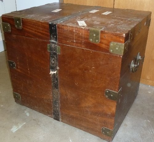 Appraisal: A large brass bound silver chest with carry handles to