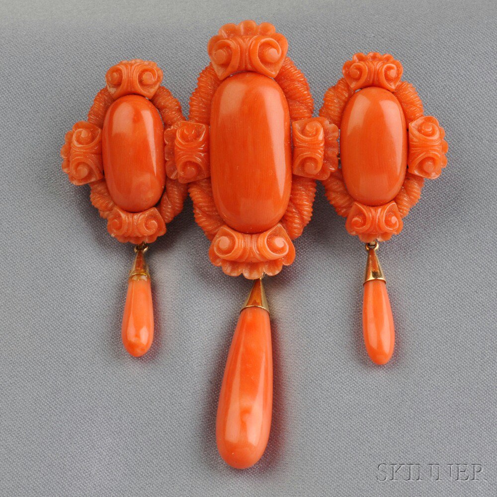 Appraisal: Antique Coral Brooch set with oval cabochons within finely carved