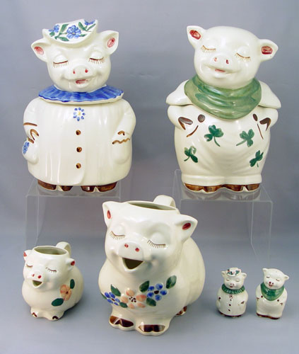 Appraisal: PIECE COLLECTION OF SHAWNEE POTTERY PIGS To include Smiley Shamrock