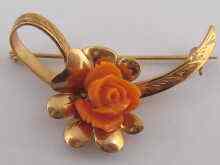 Appraisal: A yellow metal tests carat gold coral brooch approx cm