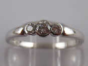 Appraisal: An carat white gold three stone diamond ring the centre