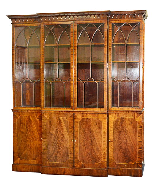 Appraisal: A GEORGIAN STYLE MAHOGANY BREAK FRONT LIBRARY BOOKCASE BY MAPLE