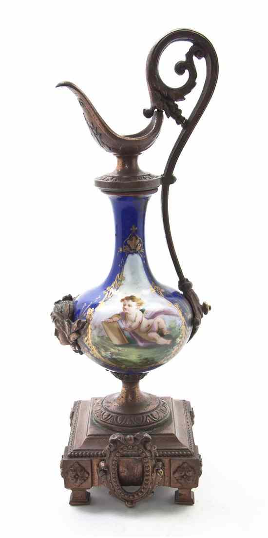 Appraisal: A Sevres Style Porcelain and Metal Mounted Ewer decorated with