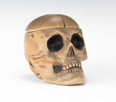 Appraisal: A Skull Humidor England Matte finish pottery lidded skull life