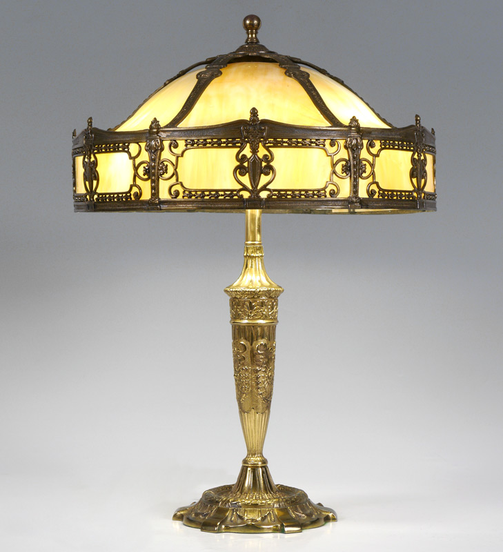 Appraisal: BENT PANEL CARAMEL SLAG GLASS LAMP Gilt cast metal base