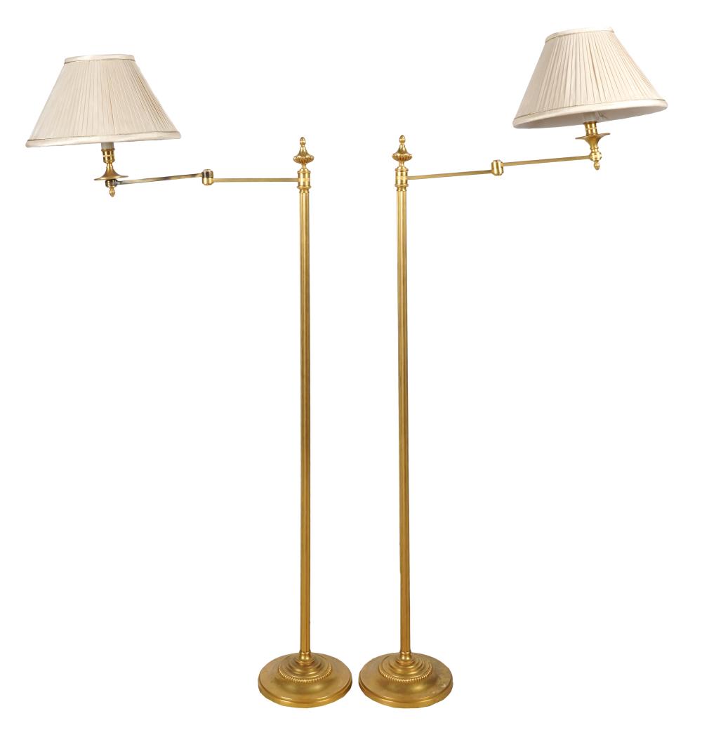 Appraisal: PAIR OF GILT METAL FLOOR LAMPSeach with articulated arm and