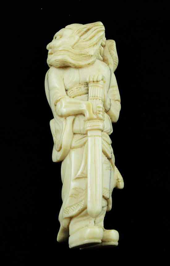 Appraisal: A Meiji period ivory netsuke carved as Shoki ins Estimate