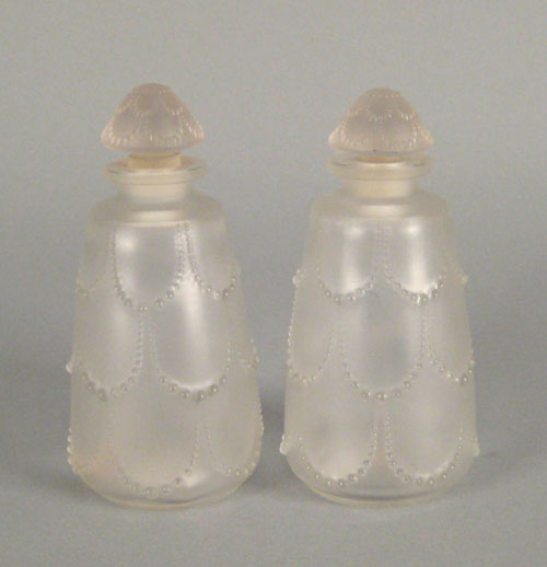 Appraisal: Pair of Lalique frosted glass toilette bottles with matching stoppers