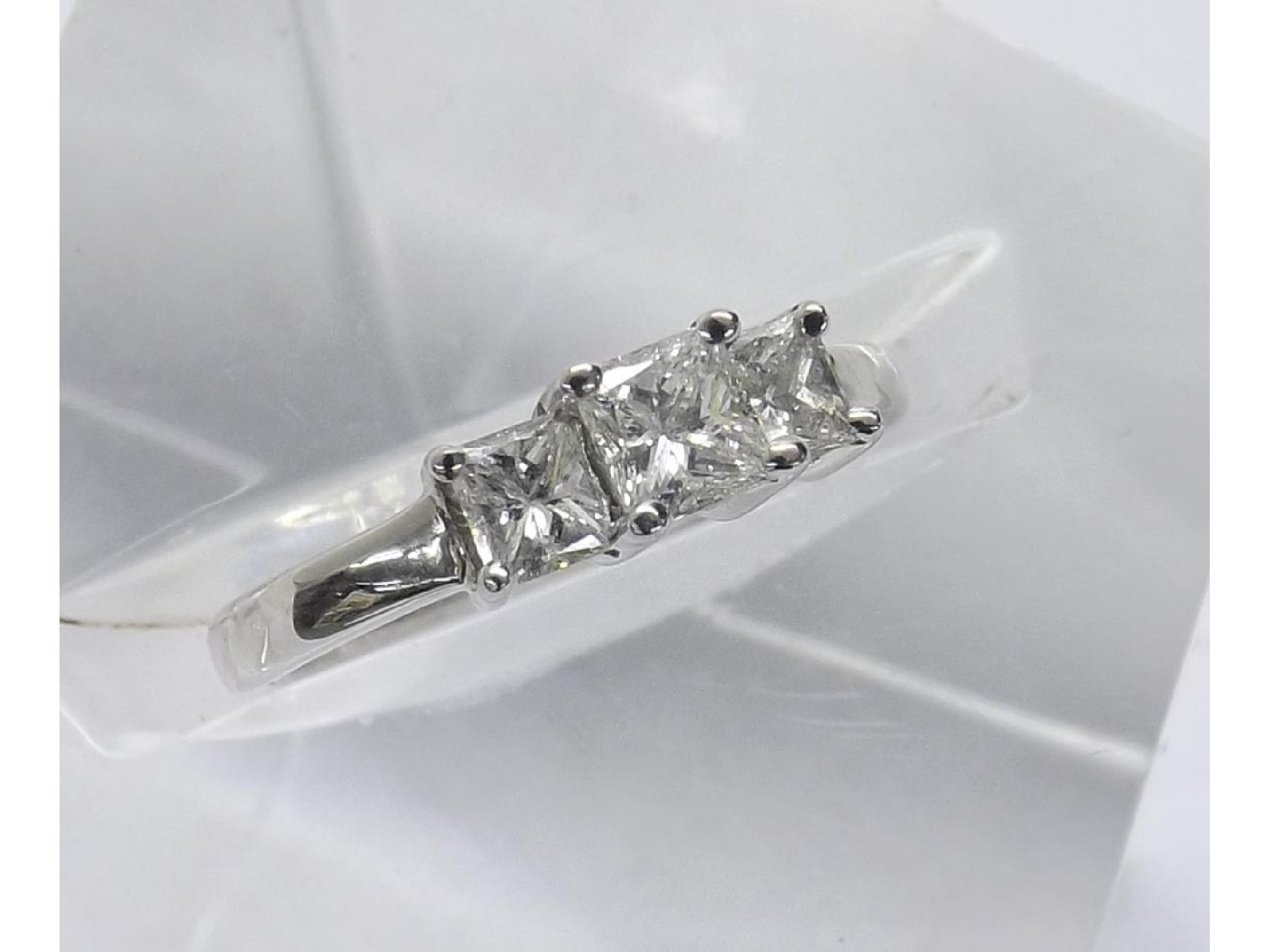 Appraisal: - -a ct white gold three stone princess-cut diamond ring