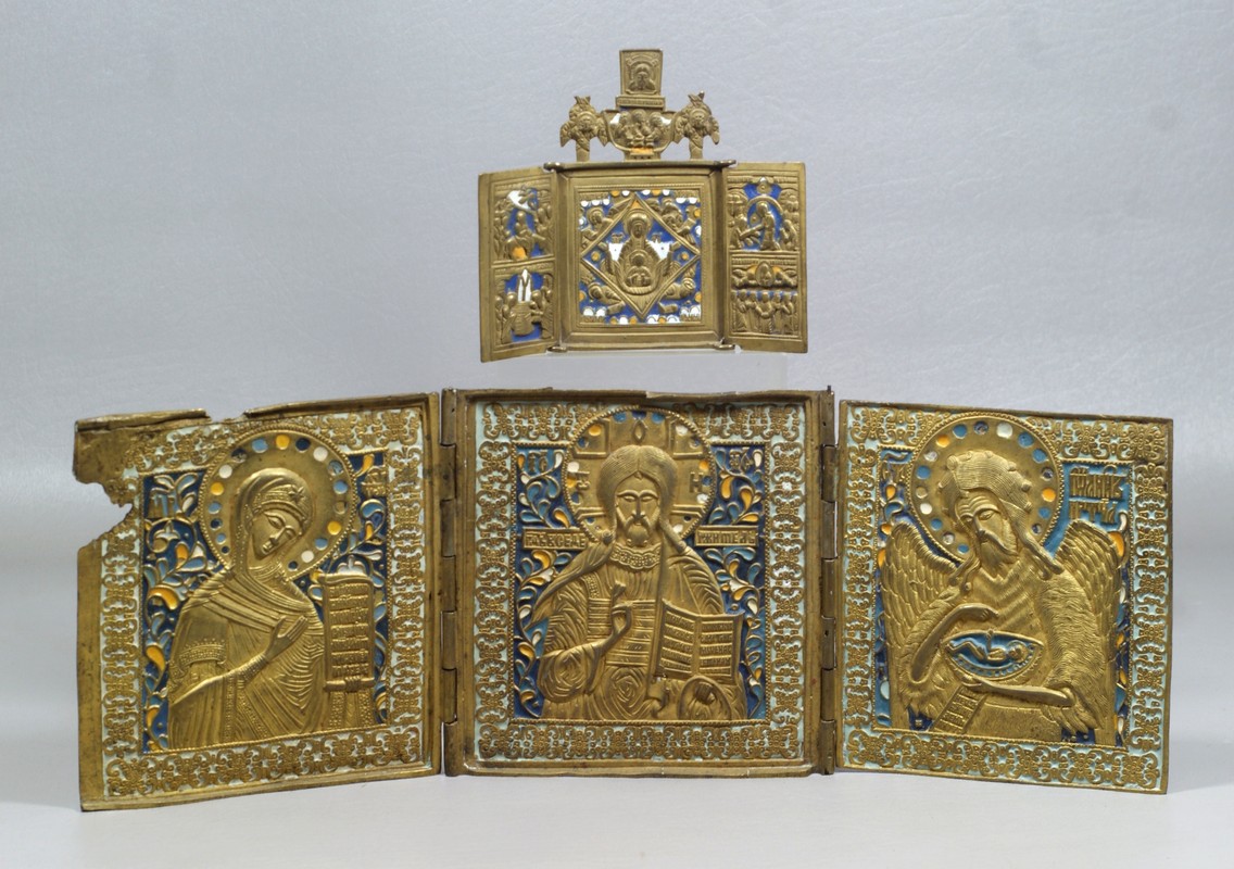 Appraisal: Enameled brass Russian folding icons damage to upper left corner