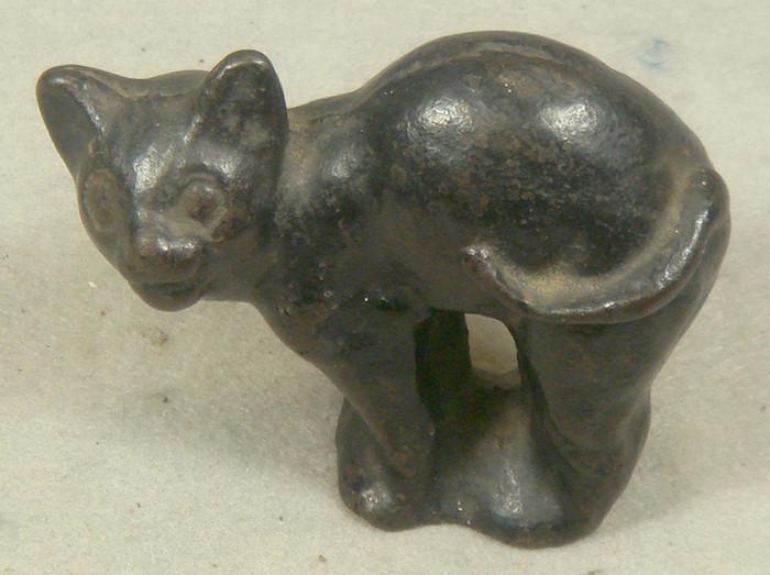 Appraisal: Cast iron doorstop small free standing black cat tall x