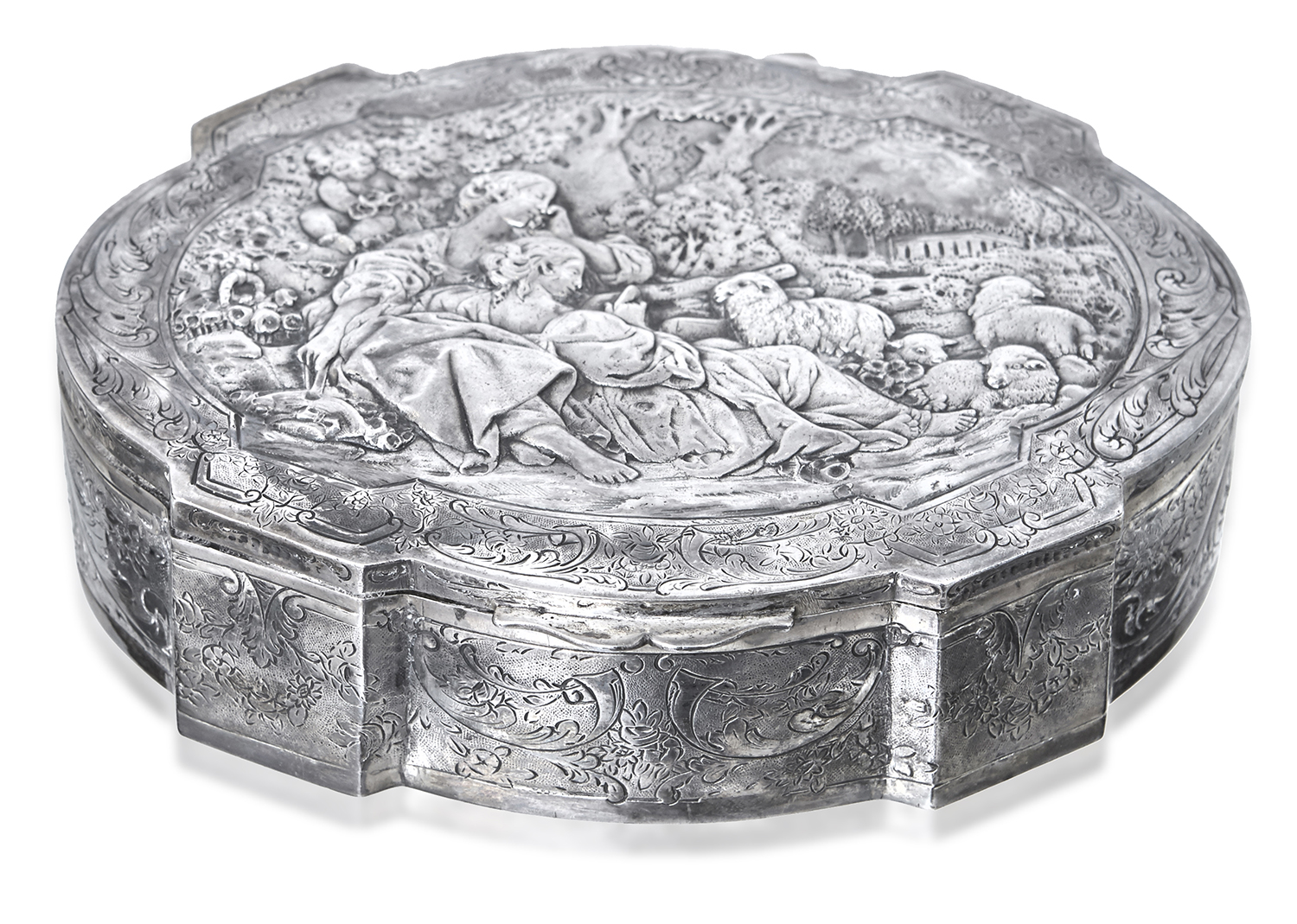 Appraisal: A CONTINENTAL SILVER JEWELLERY BOX Of shaped oval form engraved