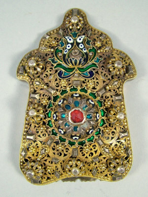 Appraisal: A th century Caucasian silver gilt and enamelled buckle part