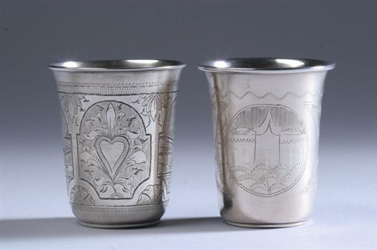 Appraisal: TWO RUSSIAN SILVER VODKA CUPS silver standard One with chased