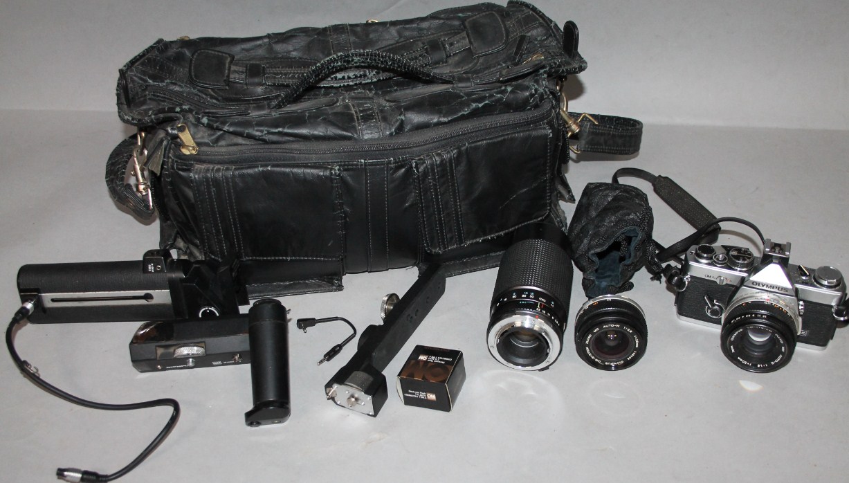 Appraisal: Various cameras and equipment to include an Olympus OM- N