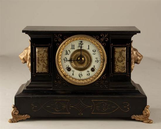 Appraisal: Ansonia Enameled Cast-iron Clock with Lion Head porcelain dial day