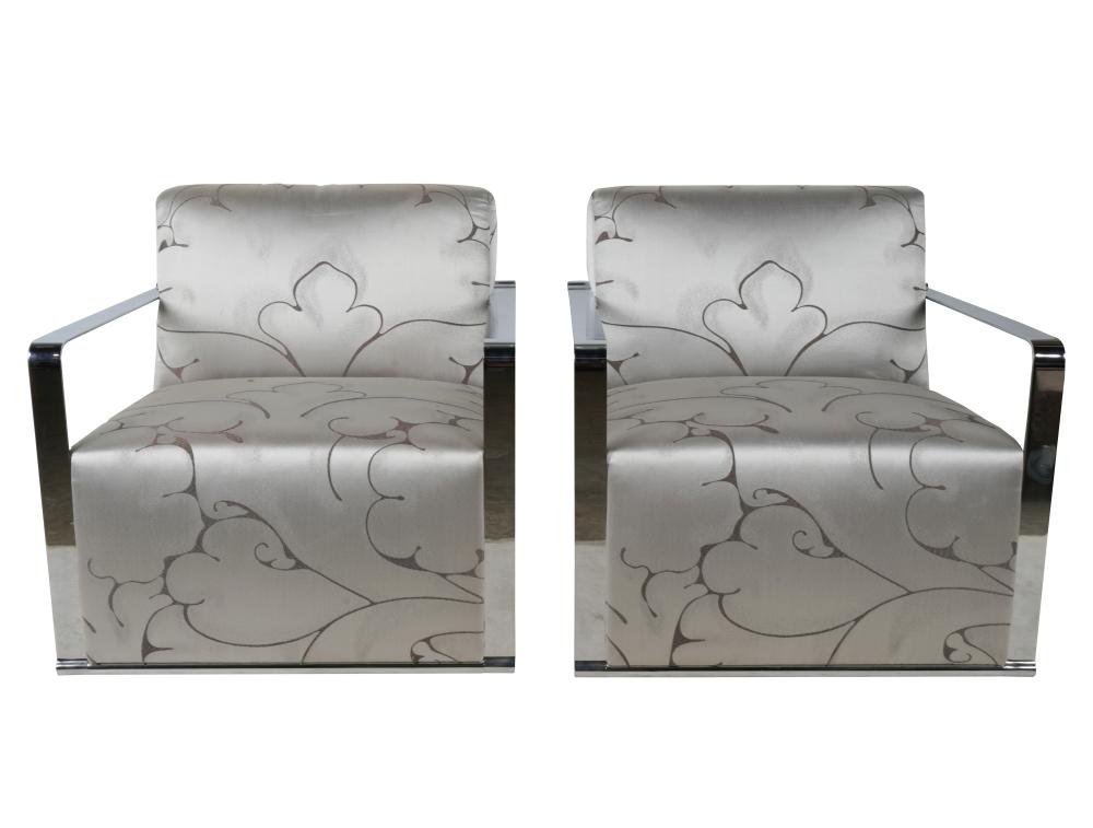 Appraisal: PAIR OF MOURA STARR ARMCHAIRSchromed metal and silver-colored fabric with