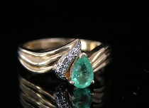 Appraisal: Ladies' Emerald Diamonds Gold Ring A k yellow gold ring