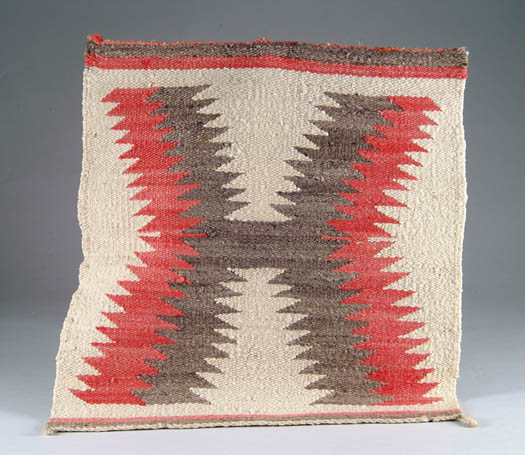 Appraisal: SMALL NAVAJO MAT Center design with red and black serrated