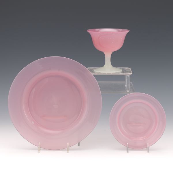 Appraisal: THREE STEUBEN ROSALINE DISHES Steuben Rosaline sherbet with underplate and