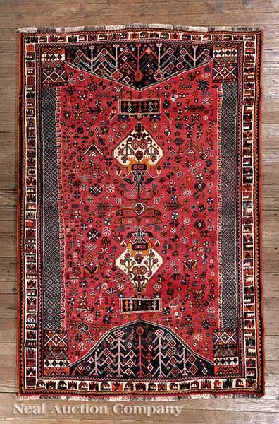 Appraisal: A Fine Persian Qashqaie Carpet red ground central field with