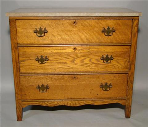 Appraisal: AMERICAN OAK MARBLE TOP CHEST OF DRAWERS The rectangular top