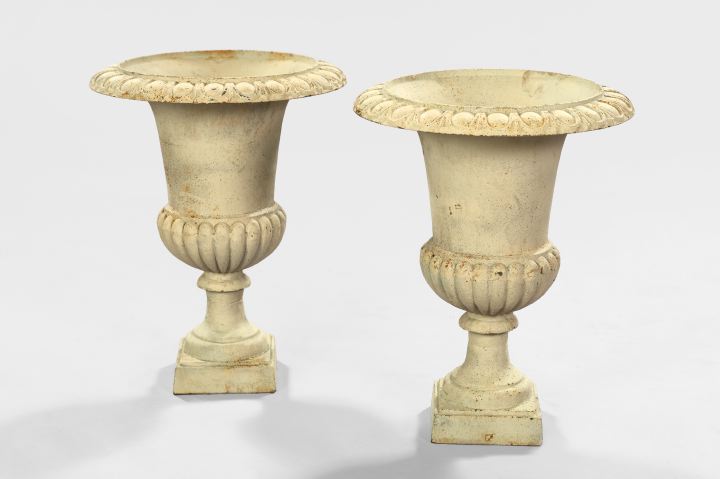 Appraisal: Pair of Cast-Iron Garden Urns of campana form each with