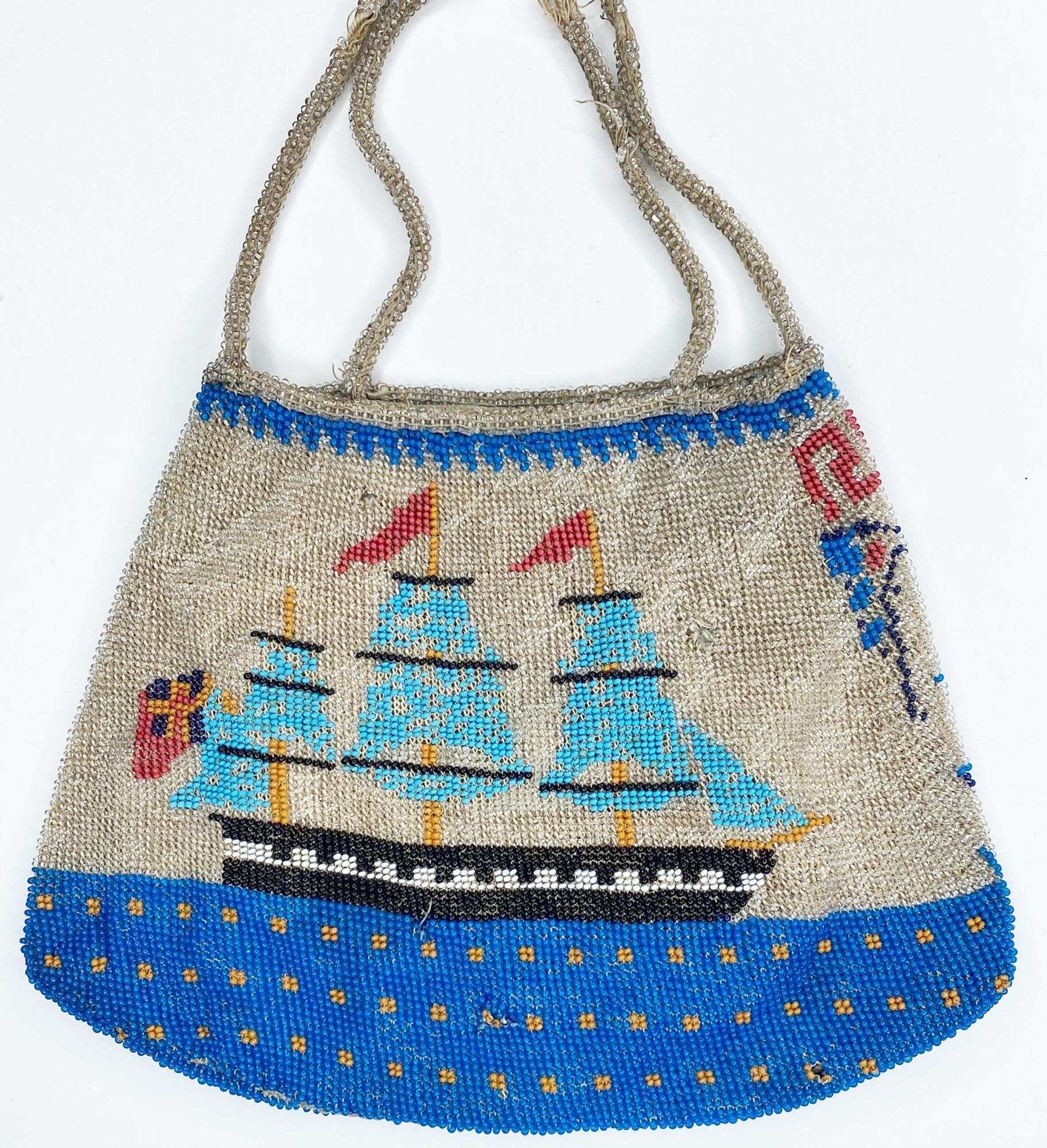 Appraisal: Micro Beaded Hand Bag with Sailing Ship long wide Condition