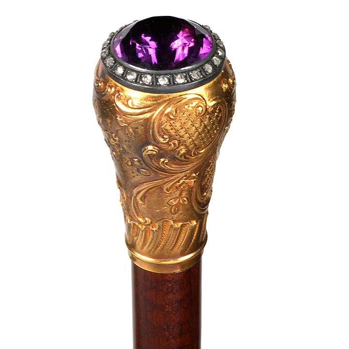 Appraisal: Amethyst and Gold Dress Cane Ca - A high relief