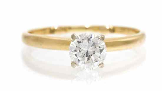 Appraisal: A Karat Yellow Gold and Diamond Solitaire Ring containing one