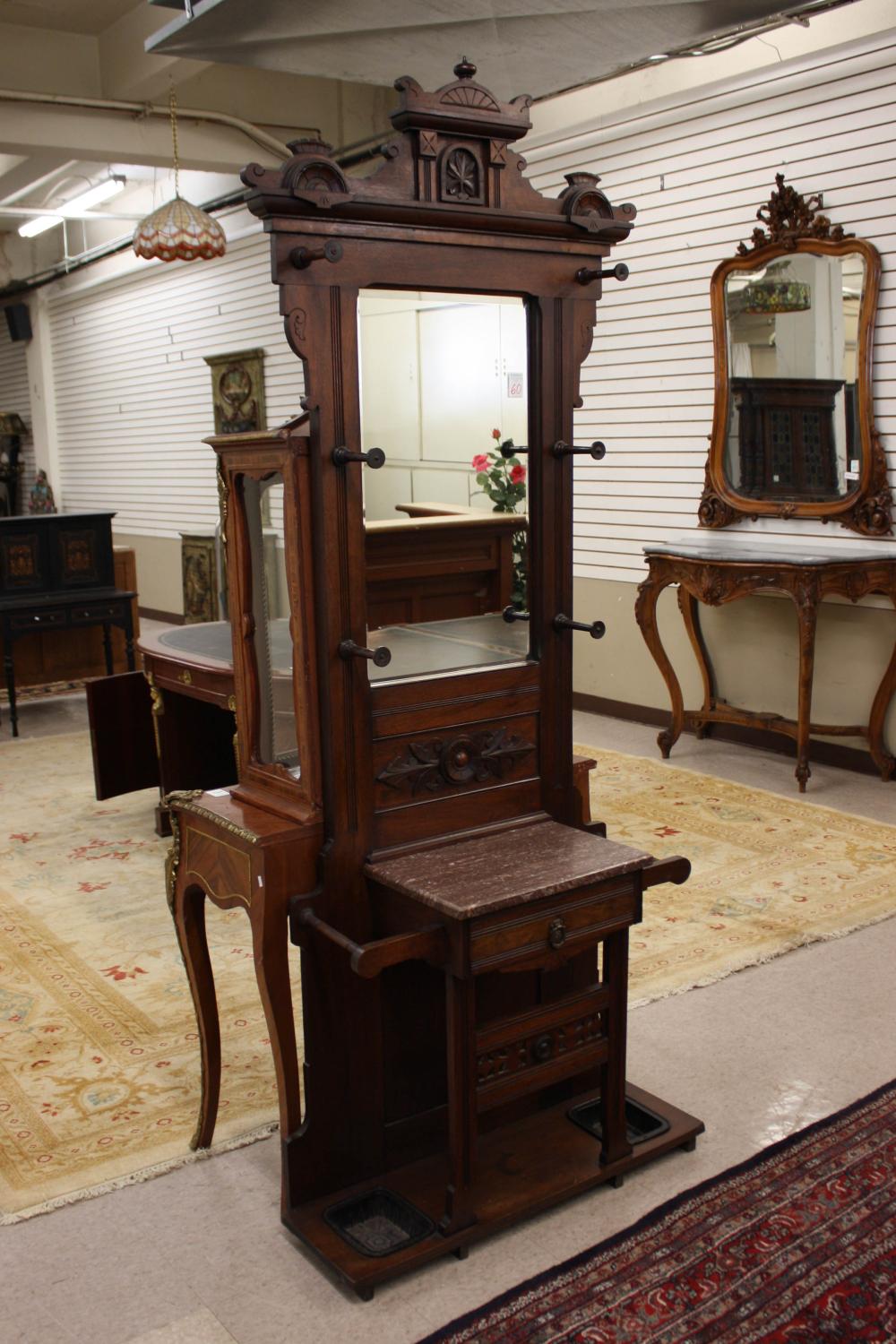 Appraisal: VICTORIAN WALNUT MARBLE-TOP HALLSTAND Eastlake movement - H x W