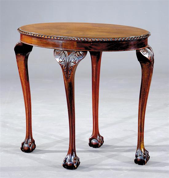 Appraisal: English Chippendale style mahogany lamp table th century oval top