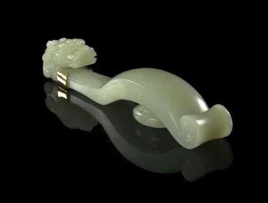 Appraisal: A Chinese Jade Belthook of a celadon hue having a