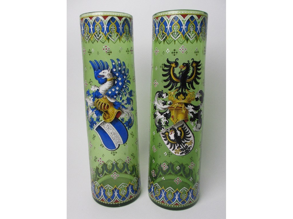 Appraisal: A pair of German green glass and polychrome vases painted