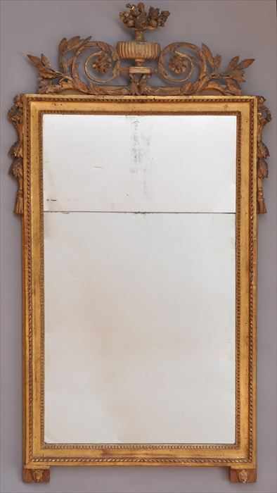 Appraisal: LOUIS XVI GILTWOOD PIER MIRROR The crest with basket of