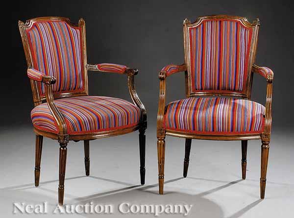 Appraisal: A Pair of Louis XVI Fruitwood Fauteuils th c shaped